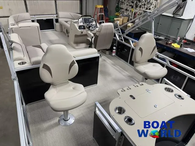 Slide: The Image of 2025 Tahoe Sport 2185 Rear Fish boat interior with Honda 4-Stroke EFI engine, beige seating. - 21