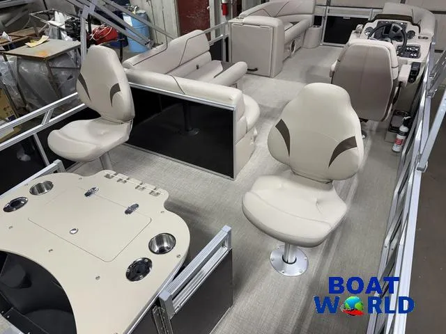 Slide: The Image of 2025 Tahoe Sport 2185 Rear Fish boat interior with seating and control panel. - 22