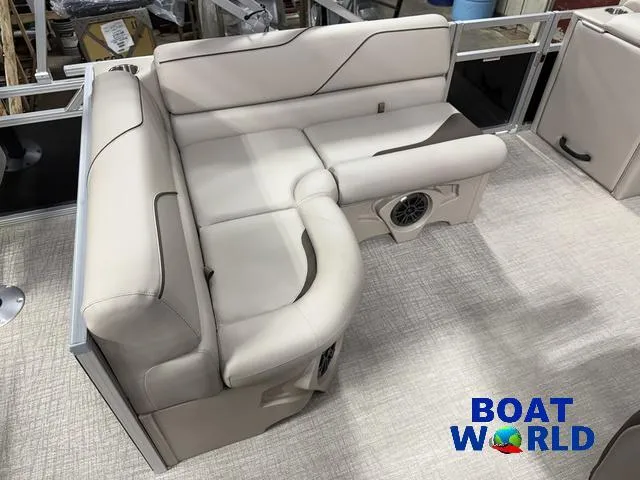 Slide: The Image of Luxurious seating on 2025 Tahoe Sport 2185 Rear Fish boat, featuring beige upholstery and integrated speaker. - 23