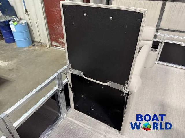 Slide: The Image of 2025 Tahoe Sport 2185 Rear Fish boat interior with seating and storage. - 25