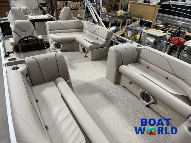 Slide: The Image of 2025 Tahoe Sport 2185 Rear Fish boat interior with beige seating and modern design. - 28
