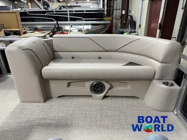 Slide: The Image of 2025 Tahoe Sport 2185 boat seating with integrated speaker, showcased at Boat World. - 30