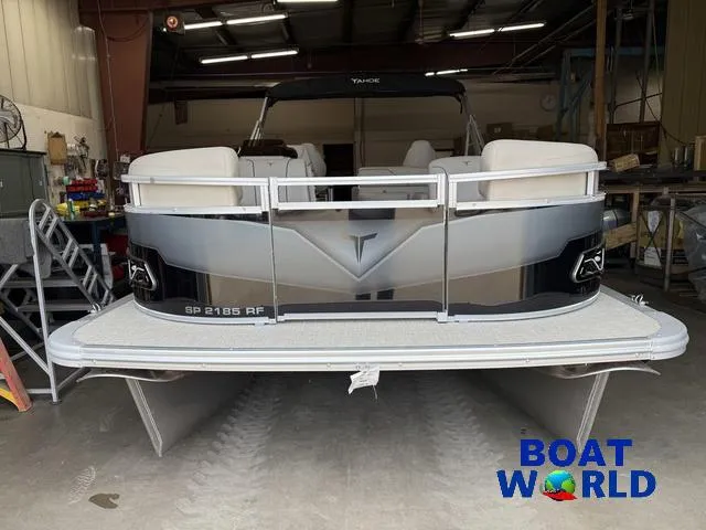 Slide: The Image of 2025 Tahoe Sport 2185 Rear Fish boat in a showroom, featuring Honda 4-Stroke EFI engine. - 33