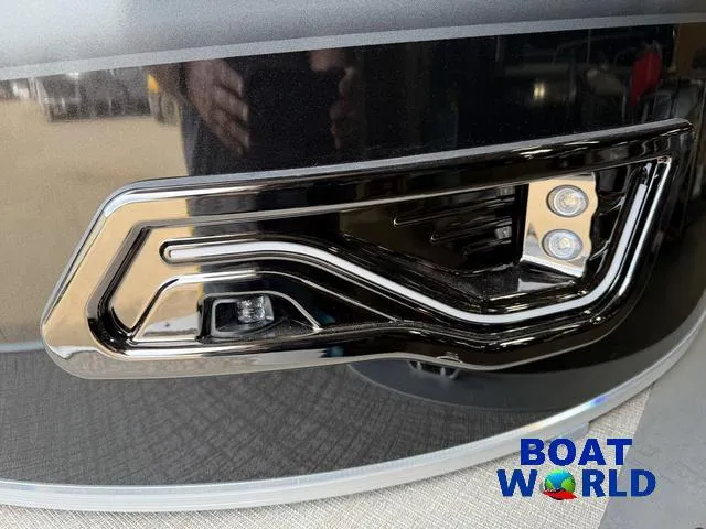 Slide: The Image of 2025 Tahoe Sport 2185 Rear Fish boat detail with modern design and Boat World logo. - 34
