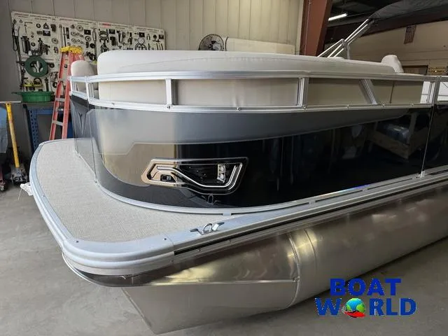 Slide: The Image of 2025 Tahoe Sport 2185 Rear Fish pontoon boat in a showroom setting. - 35