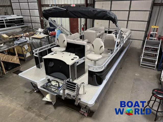 Slide: The Image of 2025 Tahoe Sport 2185 Rear Fish pontoon boat in warehouse setting. - 45
