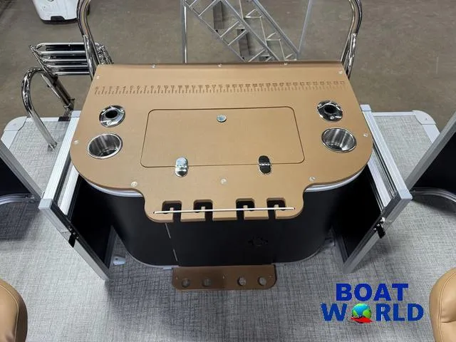 Slide: The Image of 2025 Tahoe Sport 2385 Rear Fish Tritoon deck with fishing station and cup holders. - 20