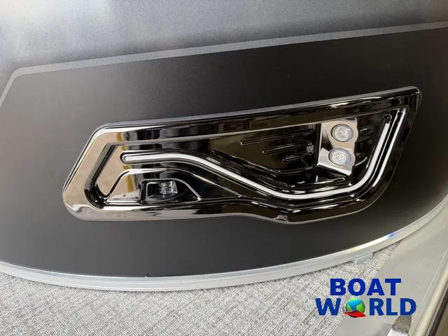 Slide: The Image of 2025 Tahoe Sport 2385 Tritoon LED light detail, featuring sleek design and modern aesthetics. - 34