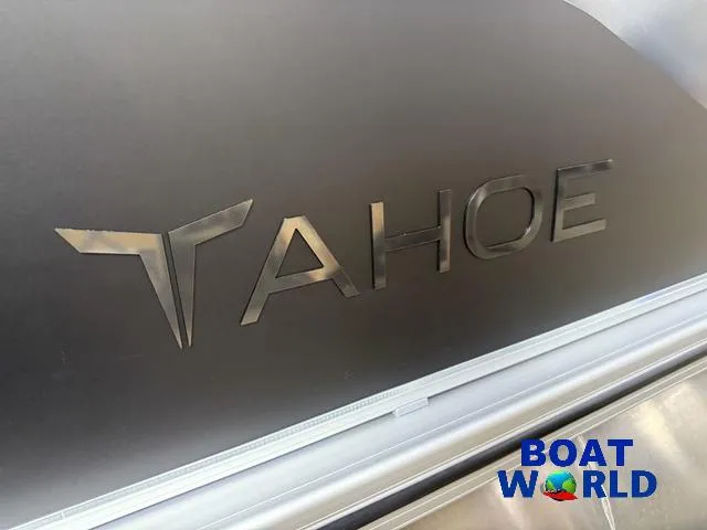 Slide: The Image of 2025 Tahoe Sport 2385 Rear Fish Tritoon logo with Boat World branding. - 36