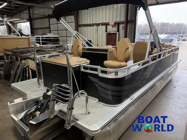 Slide: The Image of 2025 Tahoe Sport 2385 Rear Fish Tritoon with Honda 4-Stroke EFI in a warehouse setting. - 43