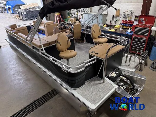 Slide: The Image of 2025 Tahoe Sport 2385 Rear Fish Tritoon with Honda 4-Stroke EFI in workshop setting. - 46