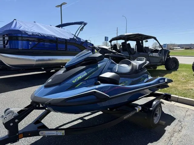 Slide: The Image of 2025 Yamaha Waverunner VX Cruiser HO with Audio on trailer, parked outdoors. - 5