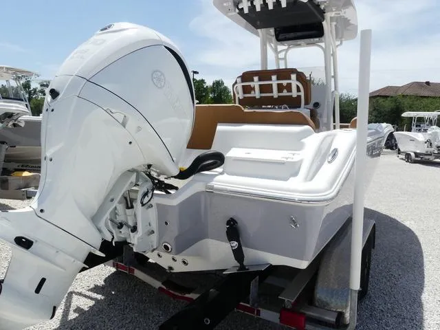 Slide: The Image of 2025 Key West 239 FS boat with powerful outboard motor on trailer. - 6