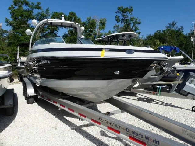 Slide: The Image of 2023 Crownline E290XSS boat silhouette with 'Photos Coming Soon' text, Boater's World Marine Centers. - 1