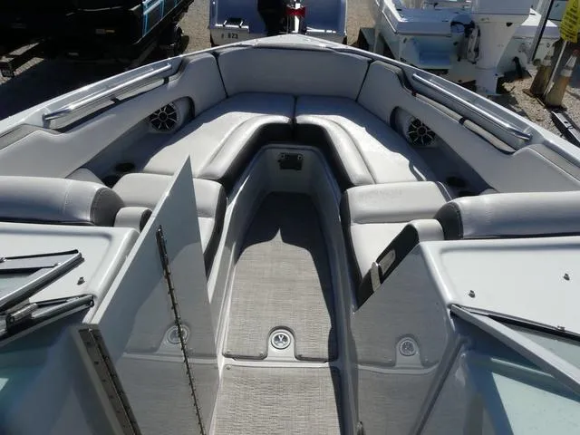 Slide: The Image of 2023 Crownline 290 XSS boat interior with spacious seating and modern design. - 13