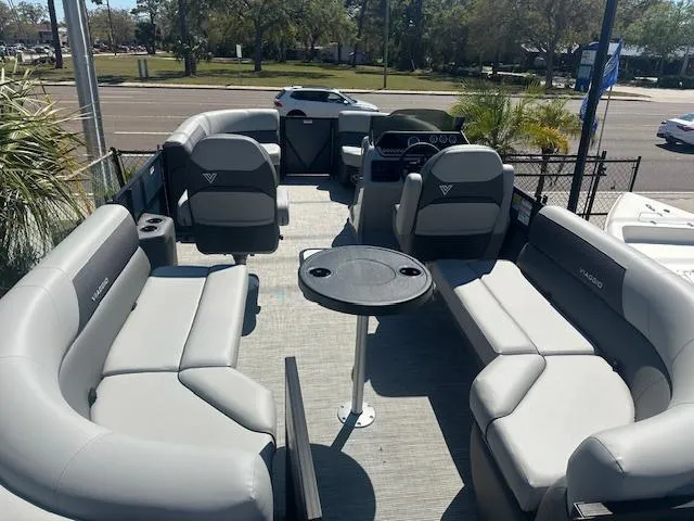 Slide: The Image of 2024 Viaggio V 20 U pontoon boat with spacious seating and central table, ideal for leisure. - 3