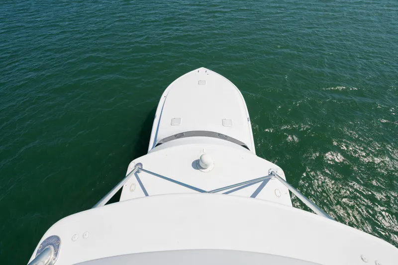 Slide: The Image of Aerial view of 2001 Viking Convertible yacht on open water. - 11
