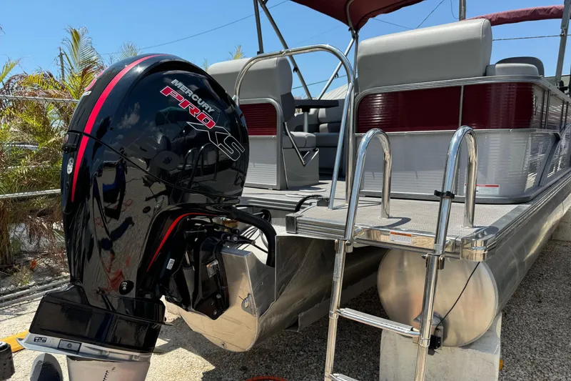 Slide: The Image of 2022 Manitou Oasis SR VP pontoon boat with Mercury Pro XS outboard motor. - 20