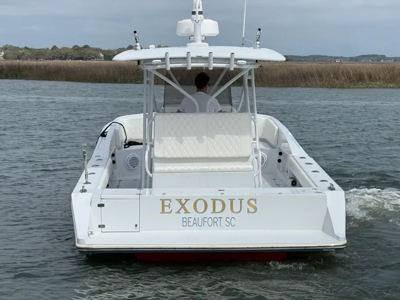 Slide: The Image of 2003 Strike 35 Cuddy boat named "Exodus" on water, Beaufort SC. - 4