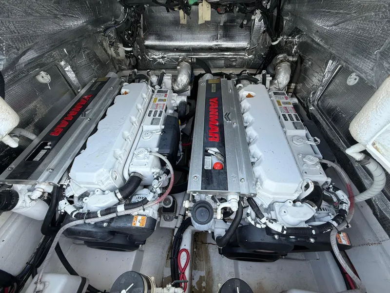 Slide: The Image of Twin Yanmar engines in a 2003 Strike 35 Cuddy boat engine room. - 7