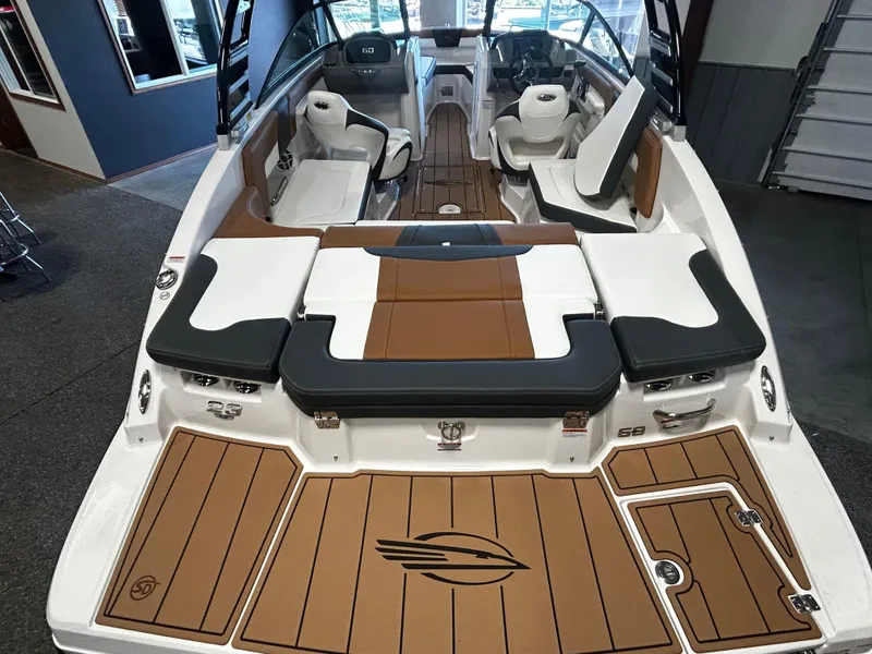 Slide: The Image of 2025 Chaparral 23 SSi boat interior with stylish seating and modern design. - 3
