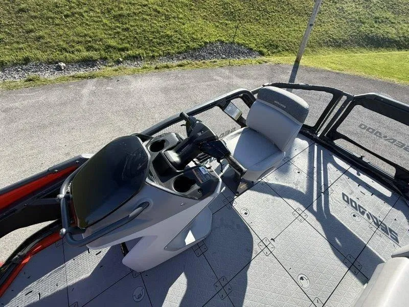 Slide: The Image of 2024 Sea-Doo SWITCH COMPACT 130HP interior with steering console and seating. - 15