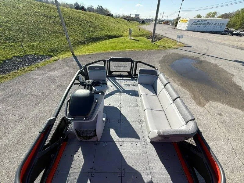 Slide: The Image of 2024 Sea-Doo SWITCH COMPACT 130HP boat with spacious seating and modern design. - 17