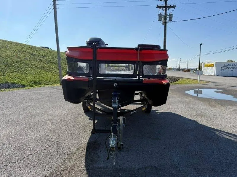 Slide: The Image of 2024 Sea-Doo SWITCH COMPACT 130HP on trailer, parked outdoors on a sunny day. - 33