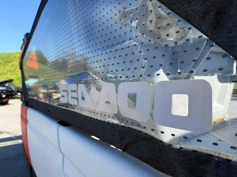 Slide: The Image of 2024 Sea-Doo SWITCH COMPACT 130HP, close-up of logo on perforated surface. - 34