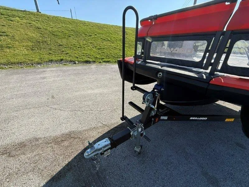 Slide: The Image of 2024 Sea-Doo SWITCH COMPACT 130HP trailer hitch on pavement, rear view. - 45