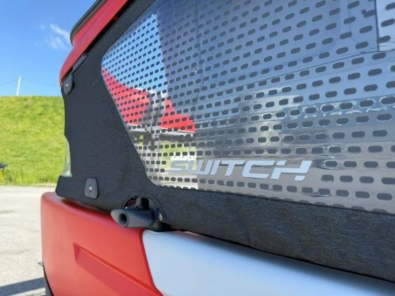 Slide: The Image of 2024 Sea-Doo SWITCH COMPACT 130HP, close-up of side panel with logo. - 49