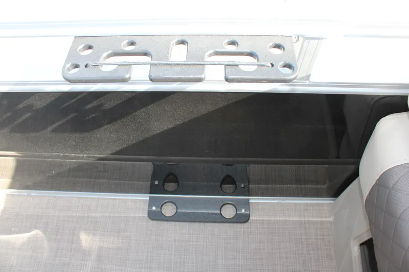 Slide: The Image of 2025 Sun Tracker SportFish 20 DLX interior detail showing seat mounting brackets. - 19