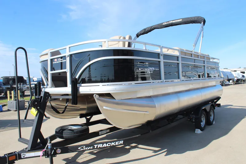 Slide: The Image of 2025 Sun Tracker SportFish 20 DLX pontoon boat on trailer, side view. - 3