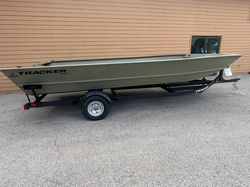 Slide: The Image of 2025 Tracker GRIZZLY 2072 Utility boat on trailer, parked outdoors. - 5