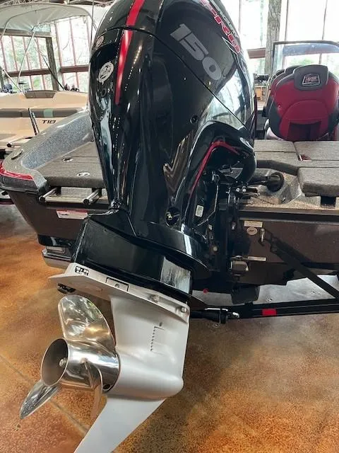 Slide: The Image of 2024 Ranger 1850MS boat with powerful outboard motor in showroom. - 6