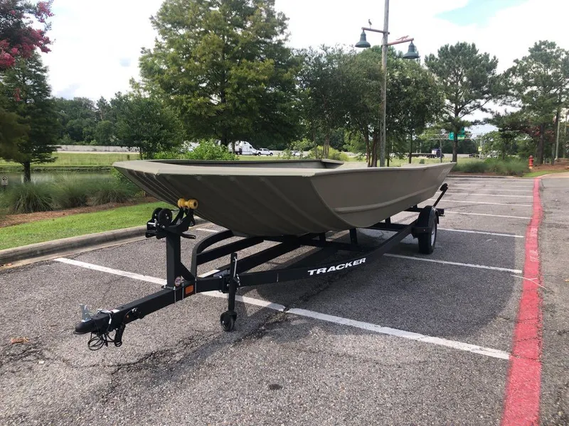 Slide: The Image of 2025 Tracker GRIZZLY 2072 Utility boat on trailer in parking lot. - 10