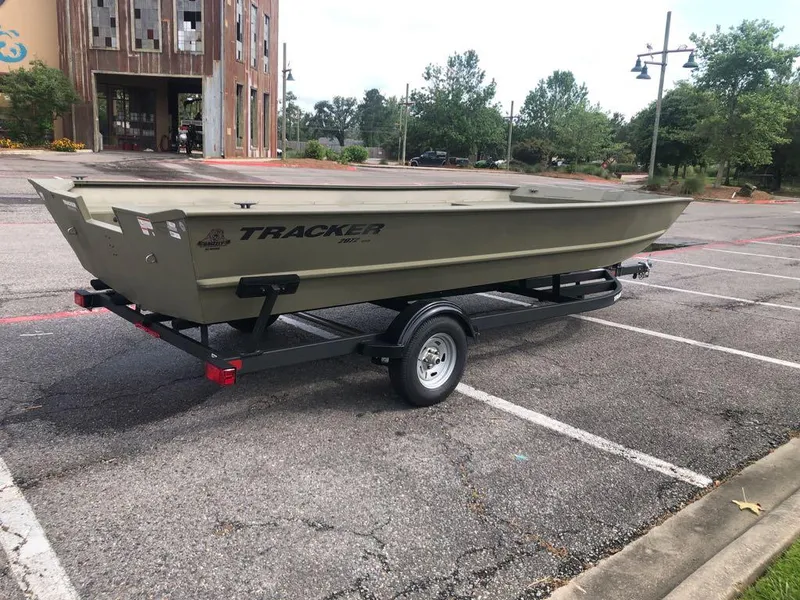 Slide: The Image of 2025 Tracker GRIZZLY 2072 Utility boat on trailer in parking lot. - 3