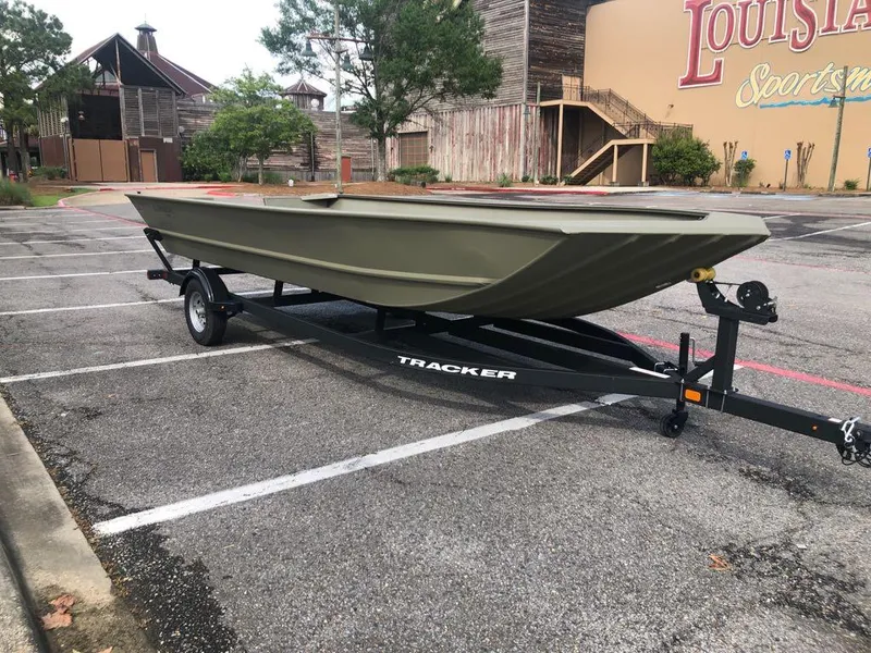 Slide: The Image of 2025 Tracker GRIZZLY 2072 Utility boat on trailer in parking lot. - 5