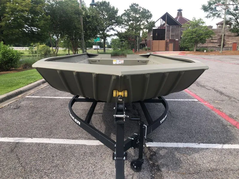 Slide: The Image of 2025 Tracker GRIZZLY 2072 Utility boat on trailer in parking lot. - 6