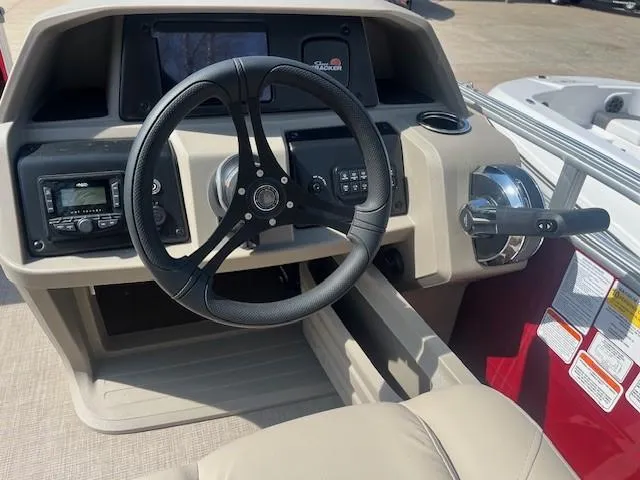 Slide: The Image of Steering console of 2025 Sun Tracker Party Barge 20 DLX pontoon boat. - 2