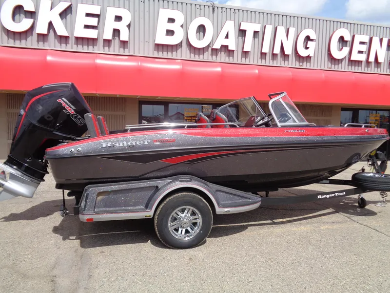 Slide: The Image of 2025 Ranger 1880MS boat on trailer at boating center. - 2