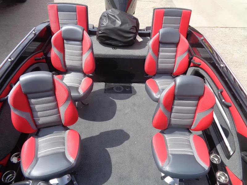 Slide: The Image of 2025 Ranger 1880MS boat interior with red and gray seating arrangement. - 6