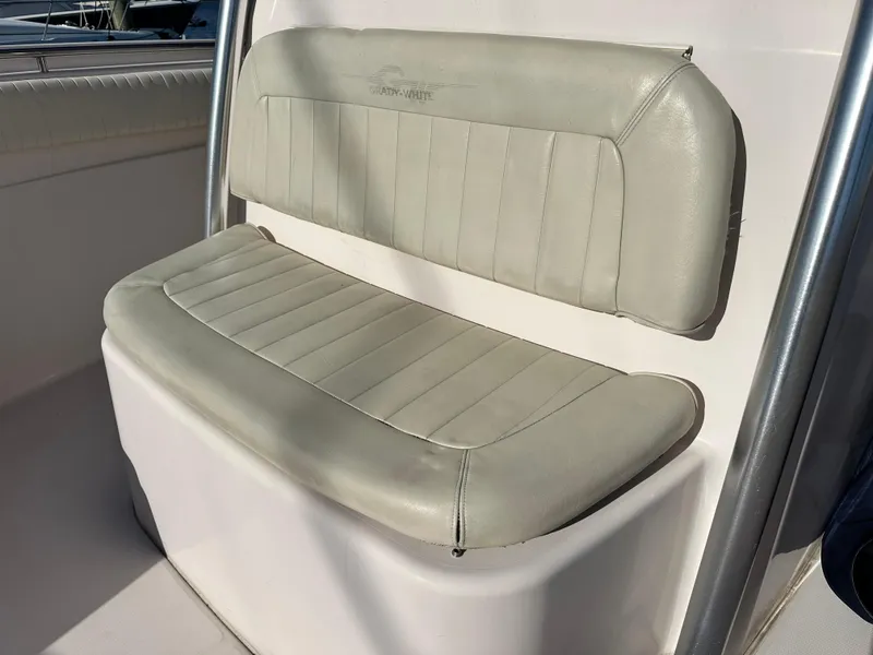 Slide: The Image of 2008 Grady-White Bimini 306 boat seat with light gray upholstery. - 10