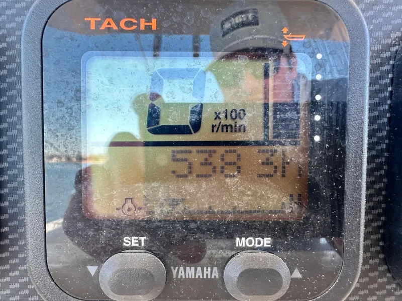 Slide: The Image of Yamaha tachometer display on 2008 Grady-White Bimini 306 boat showing RPM and hours. - 22