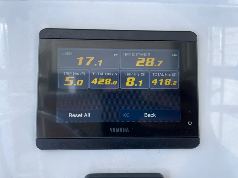 Slide: The Image of Yamaha display showing fuel usage and trip data on a 2022 Contender 25 Tournament boat. - 13