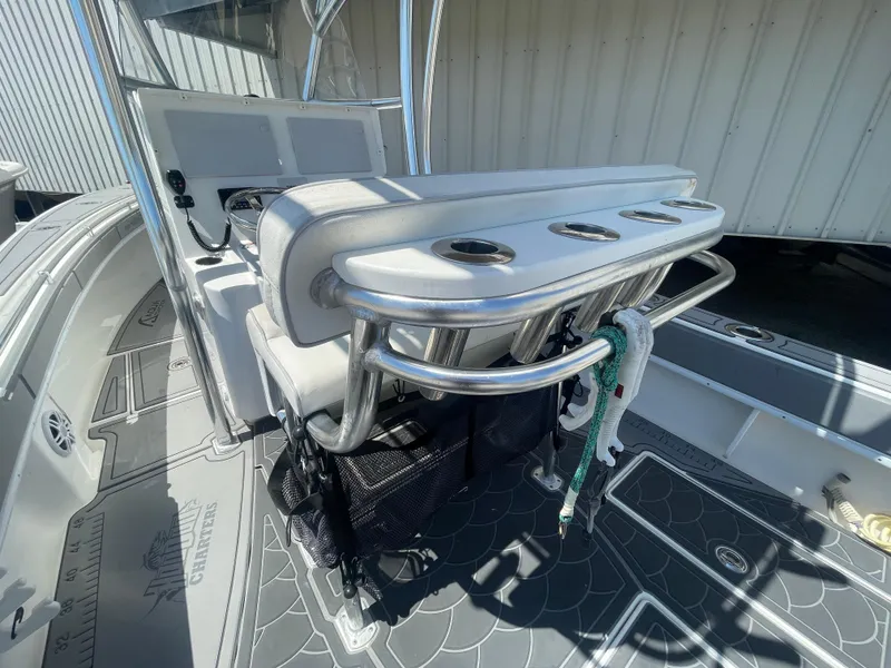 Slide: The Image of 2022 Contender 25 Tournament boat interior with rod holders and seating. - 15