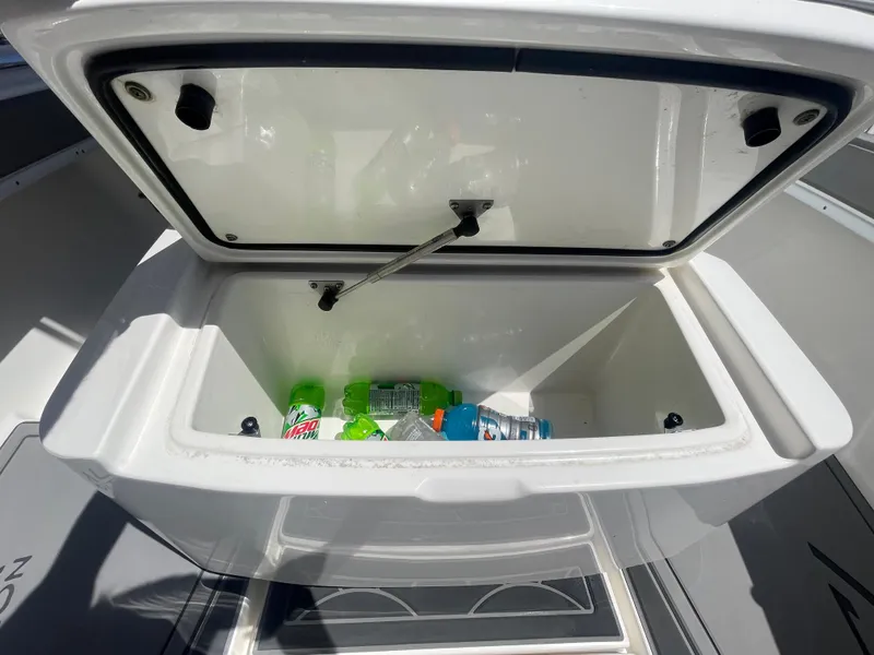 Slide: The Image of Open cooler on 2022 Contender 25 Tournament boat with drinks inside. - 23