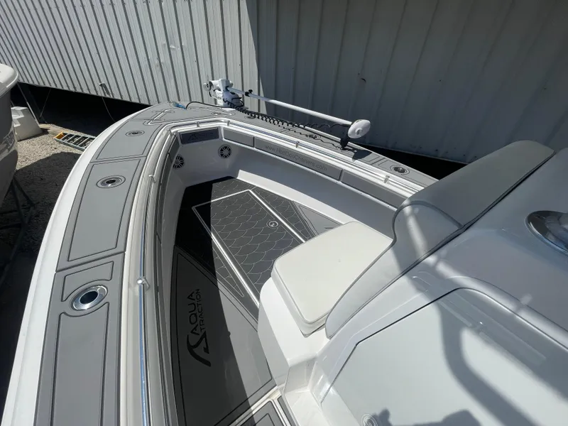 Slide: The Image of 2022 Contender 25 Tournament boat, featuring sleek seating and modern deck design. - 7