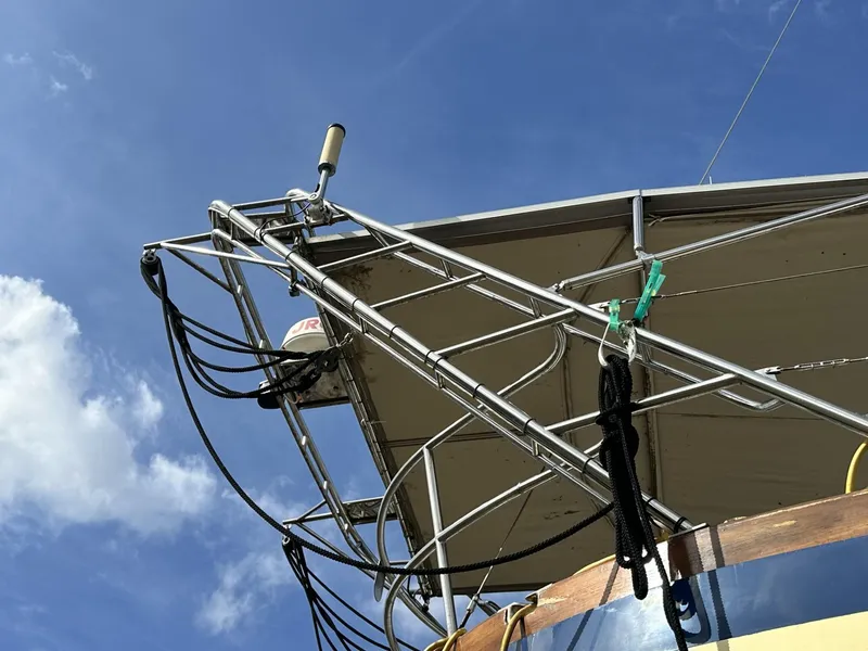 Slide: The Image of Sailboat rigging on a 1986 Slocum 43 against a clear blue sky. - 32