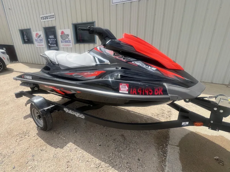 Slide: The Image of 2017 Yamaha WaveRunner VX Deluxe on trailer, parked outside a building. - 1